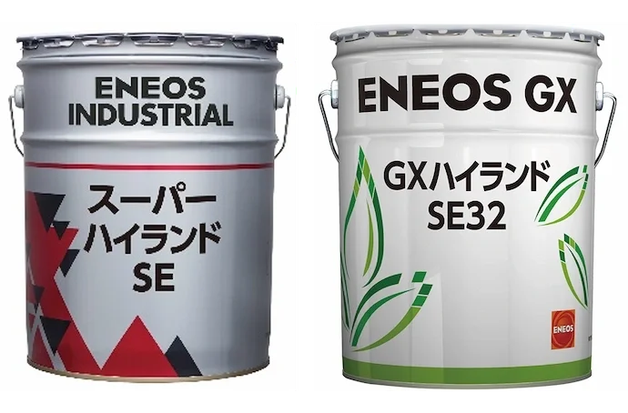 Hai thùng dầu thủy lực ENEOS: Super Hyrando SE màu bạc họa tiết đỏ và GX Hyrando SE32 trắng viền lá xanh